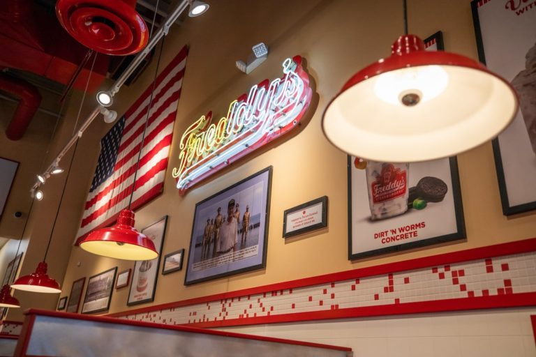 Freddy's neon sign in a Freddy's franchise location